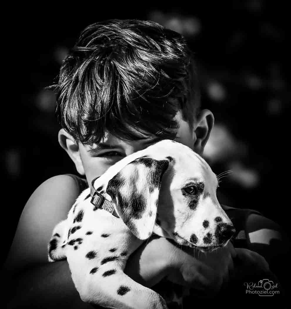 Photo d&apos;un enfant avec son chien