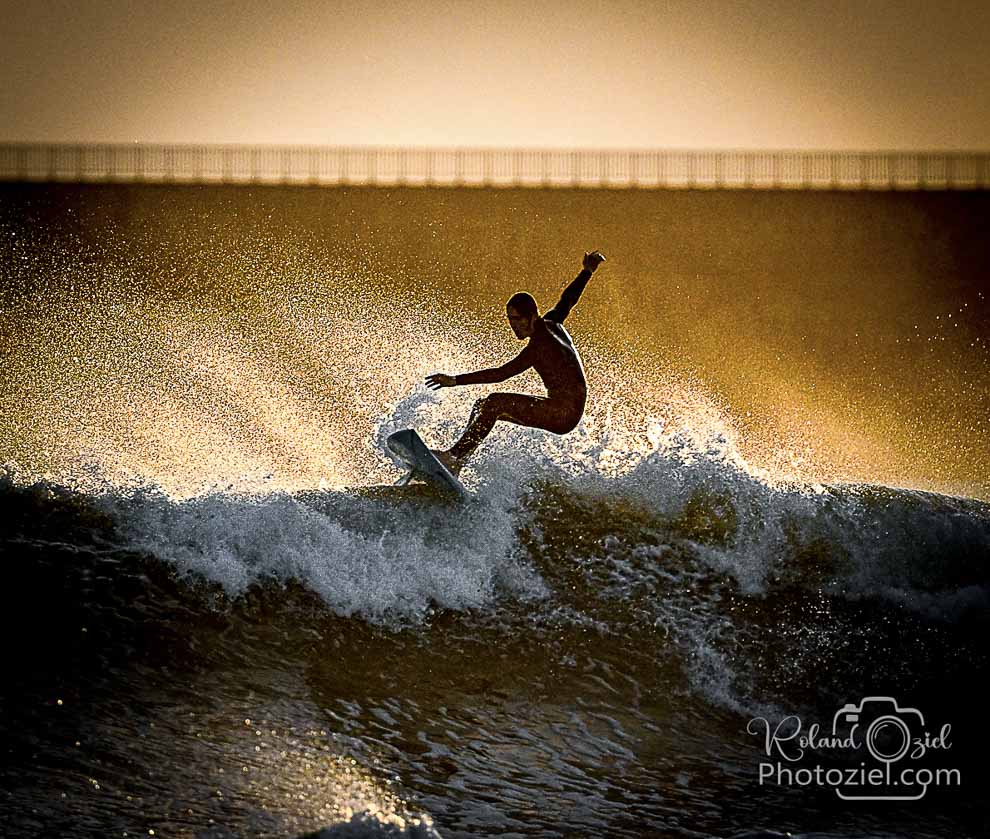 Photographie de surf avec coucher de soleil