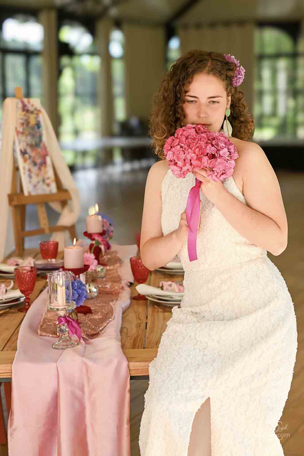 Photo de mariage avec la mariée et un bouquet de fleur